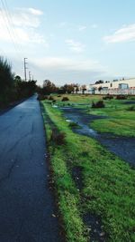 Road passing through field