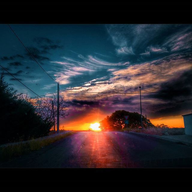 sunset, sky, electricity pylon, power line, road, cloud - sky, transportation, silhouette, connection, power supply, electricity, tree, sun, the way forward, cloud, cable, fuel and power generation, cloudy, orange color, nature