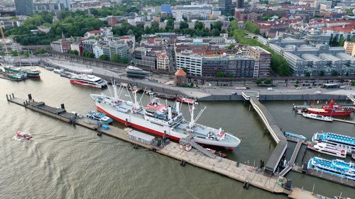 High angle view of city by river