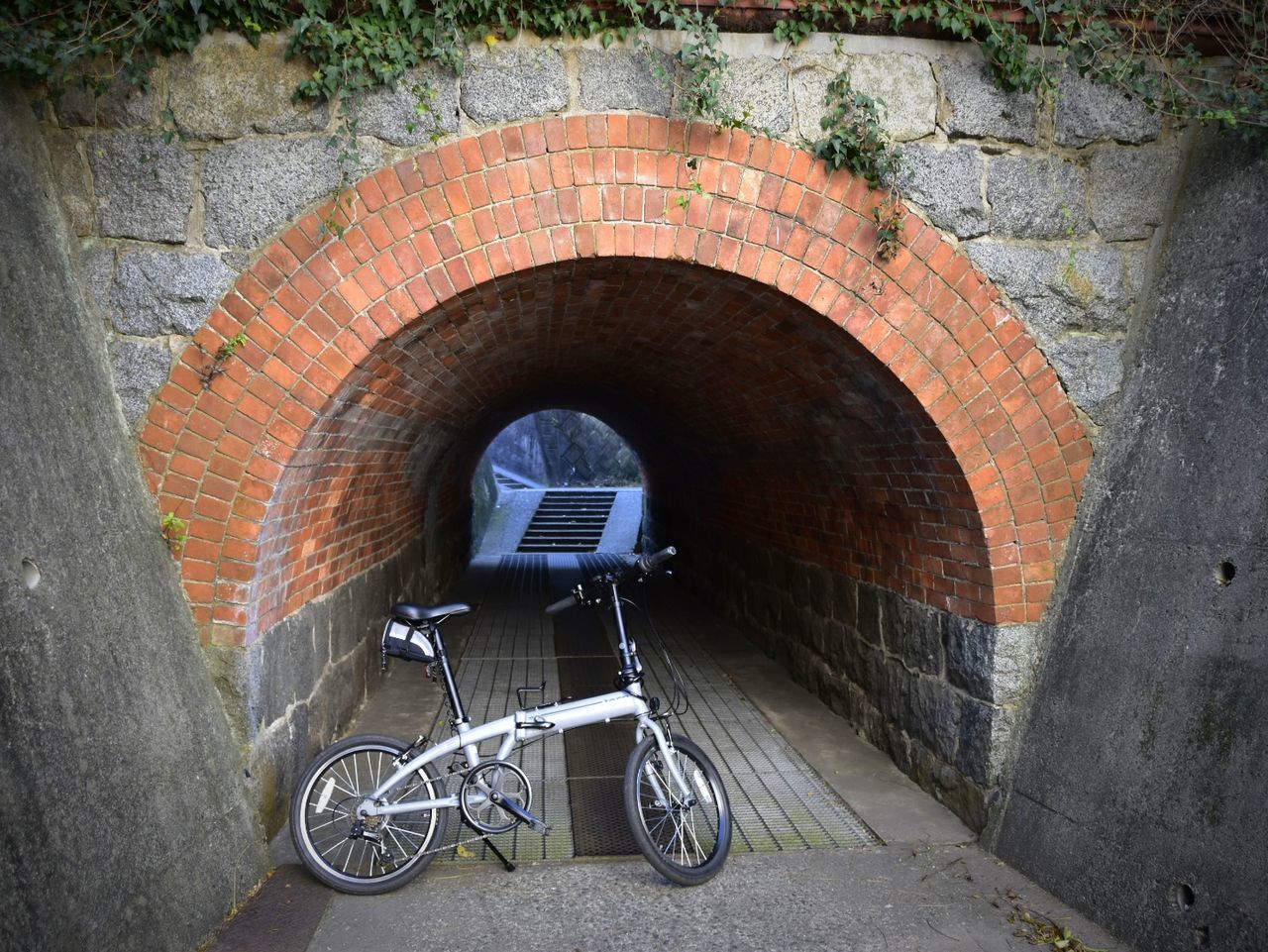 brick wall, transportation, architecture, arch, built structure, mode of transport, bicycle, tunnel, land vehicle, building exterior, outdoors, day, no people