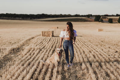 Full length of a young man in a field