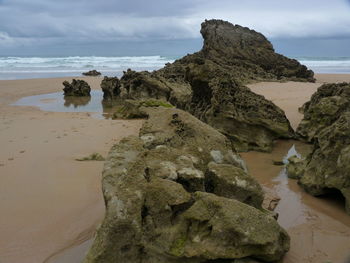 Scenic view of beach against sky