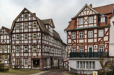 Buildings in city against sky