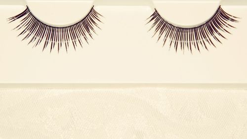 Umbrellas on beach against clear sky