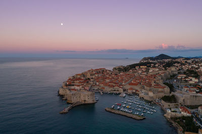 High angle view of sea against sky during sunset