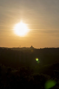 Scenic view of silhouette landscape against sky during sunset