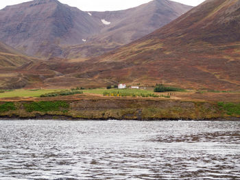 View of lake with mountain range in the background