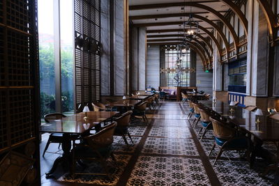 Filipino large interior of a moody dinning area hall no people