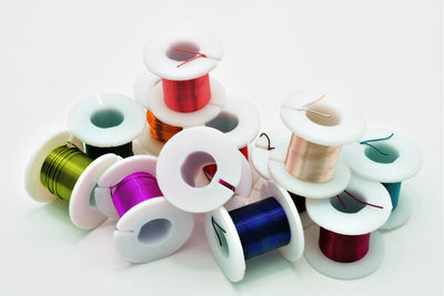 High angle view of various eggs on white background