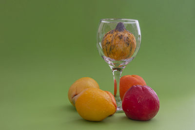 Close-up of fruits in glass on table