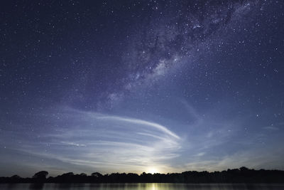 Scenic view of star field against sky at night