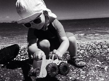 Boy playing at beach