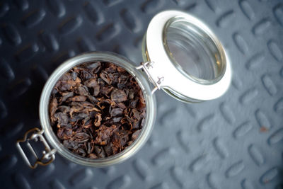 High angle view of coffee in jar on table