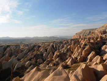 Panoramic view of rock formations against sky