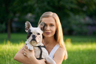 Portrait of woman with dog