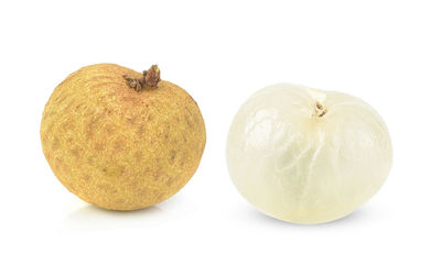 Close-up of apple against white background