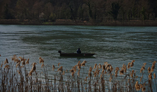 Scenic view of lake against trees