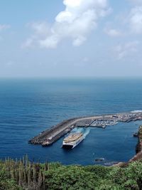 Scenic view of sea against sky with a ferry in agaete,  gran canaria