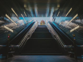 High angle view of escalator and steps in subway