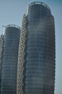 Low angle view of modern building against clear sky