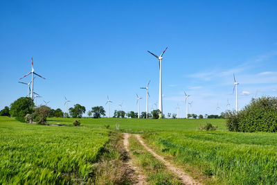 Wind turbines in an agricultural area seen in germany