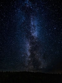 Low angle view of stars in sky at night