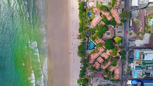 High angle view of townscape by sea