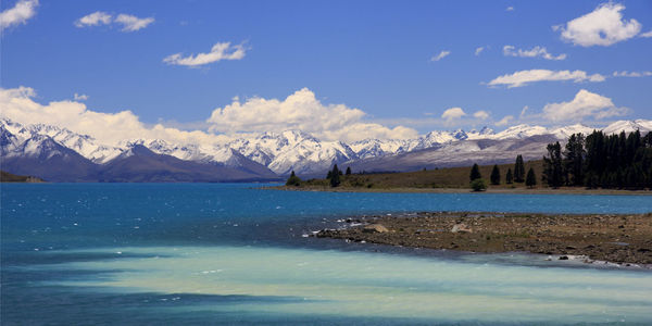 View of lake against cloudy sky