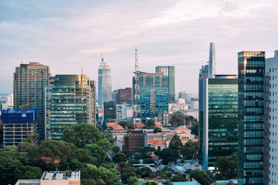 Buildings in city against sky