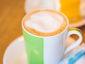 Close-up of cappuccino on table