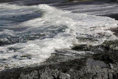 Waves splashing on sea