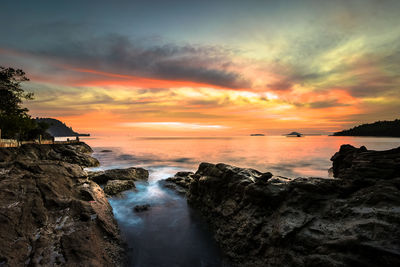 Scenic view of sea against sky during sunset