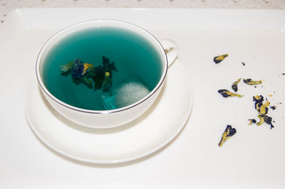 High angle view of water in bowl on table