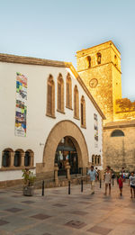 Group of people in front of building