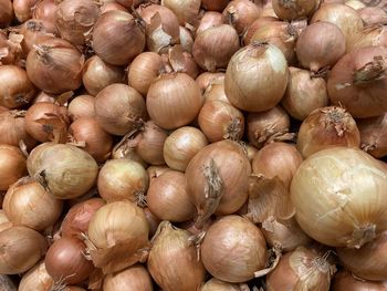 Full frame shot of onions for sale at market