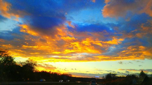 Scenic view of cloudy sky at sunset
