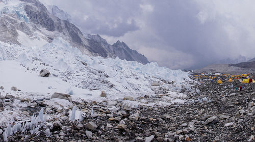 Scenic view of snowcapped mountains against sky