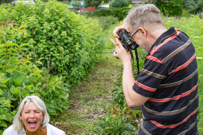 Man photographing on camera