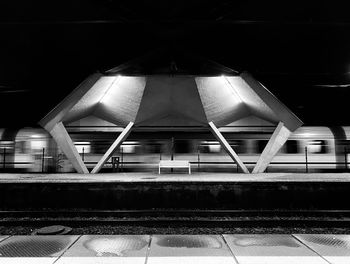 Railroad station platform at night