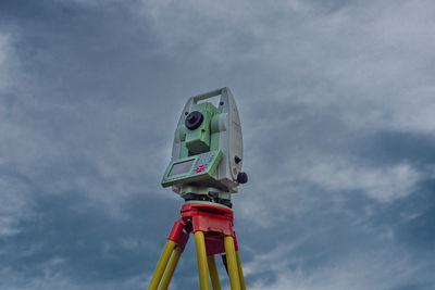 Low angle view of ferris wheel against sky