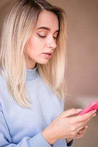 Beautiful young woman with eyes closed