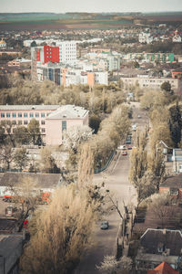 High angle view of street amidst buildings in city