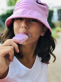 Close-up of young girl eating an ice cream