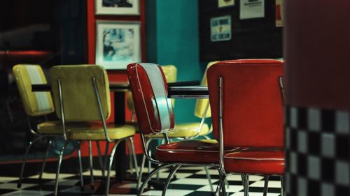 Empty chairs in cafe