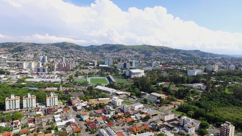 Aerial view of town against sky