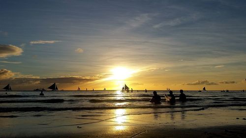 Scenic view of sea at sunset