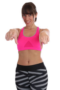 Portrait of a smiling young woman over white background