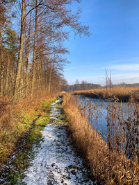 Scenic view of lake against sky. winter