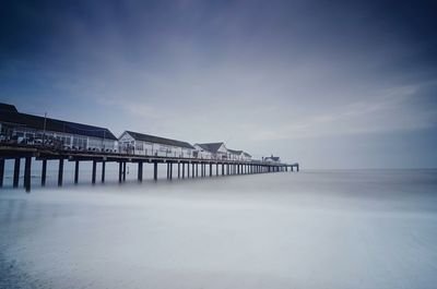 Pier on sea against sky