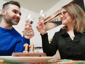 Smiling couple with drinks